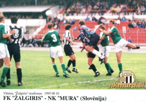 Prizor s tekme Žalgiris Mura, ki je bila odigrana 10. avgusta 1995 v Vilni. Gneča v kazenskem prostoru Mure in posredovanje vratarja Štefana Černjaviča. Prizor s tekme Žalgiris Mura, ki je bila odigrana 10. avgusta 1995 v Vilni. Gneča v kazenskem prostoru Mure in posredovanje vratarja Štefana Černjaviča.