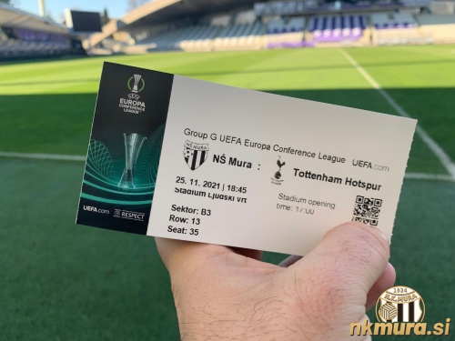 Vstopnica za tekmo Mura : Tottenham. V ozadju je stadion Ljudski vrt v Mariboru. Vstopnica za tekmo Mura : Tottenham. V ozadju je stadion Ljudski vrt v Mariboru.